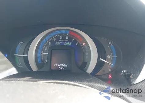 2011 Honda Insight Ex from USA, damaged, VIN JHMZE2H72BS008161